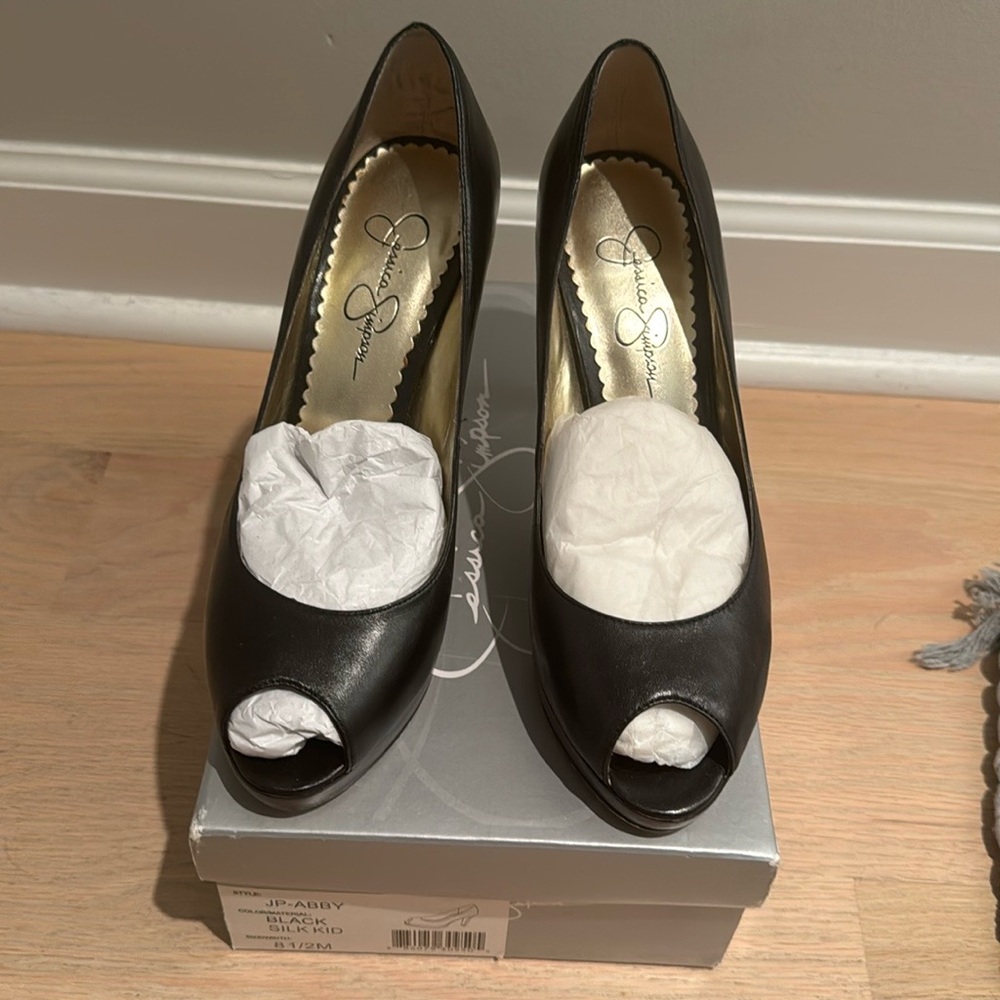 Jessica Simpson black leather peep toe platform heels, size 8.5